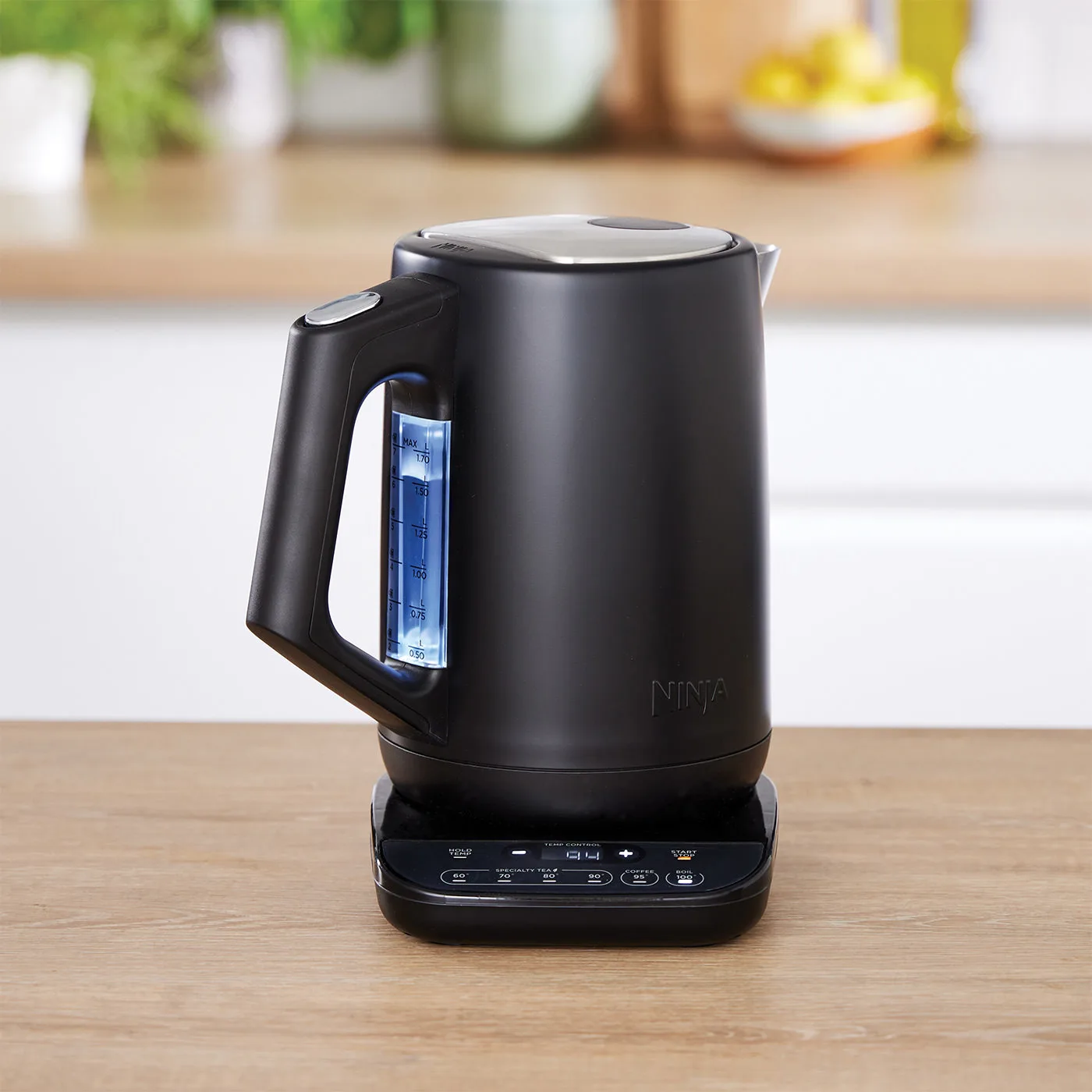 Ninja-KT200UK-Black_Kettle-Kitchen_Counter-LightsOn-SideMeasurements